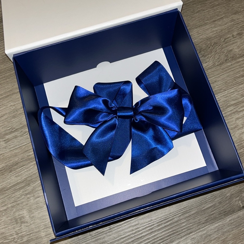 White Gift Box with Blue Ribbon